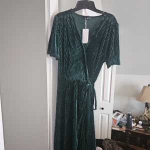 Emerald green velvet dress
